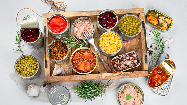 Canned vegetables fish and peas in aluminium cans
